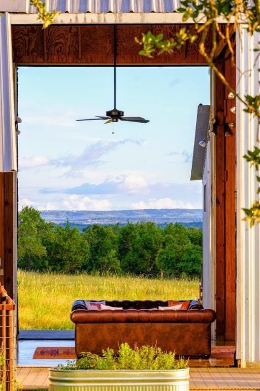 view of yard featuring ceiling fan