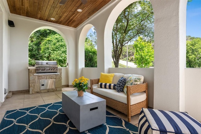 view of patio / terrace featuring an outdoor hangout area, grilling area, and exterior kitchen