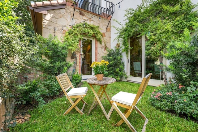 view of patio with a balcony