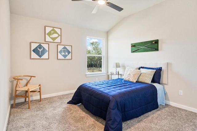 carpeted bedroom with vaulted ceiling and ceiling fan