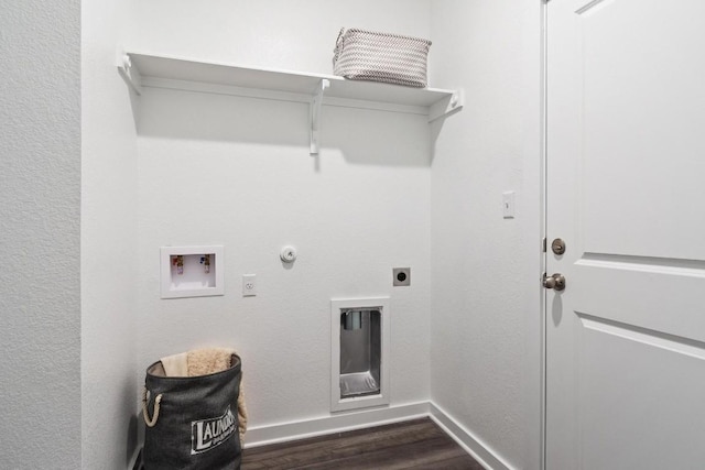 laundry room with hookup for a washing machine, gas dryer hookup, electric dryer hookup, and dark hardwood / wood-style floors