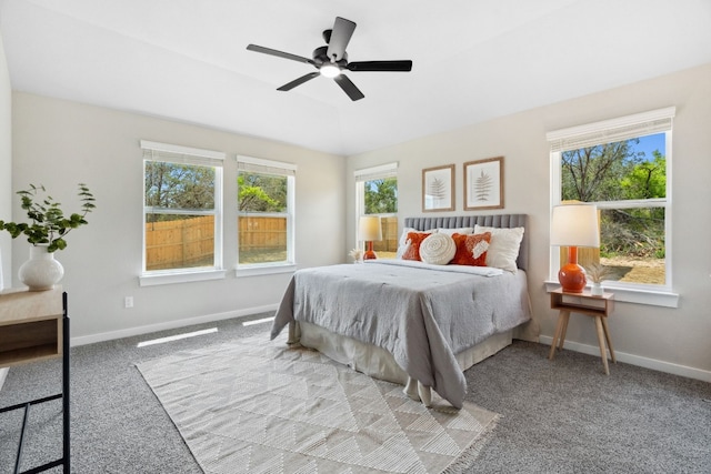 bedroom featuring light carpet and ceiling fan