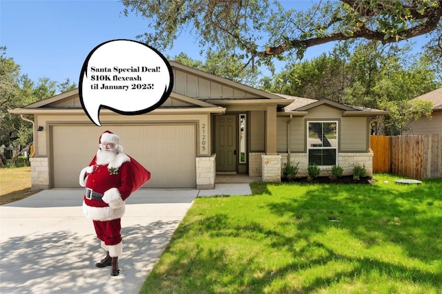 view of front of house with a front lawn and a garage