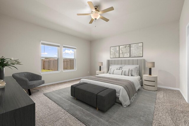 bedroom with ceiling fan and carpet floors