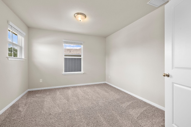 view of carpeted spare room