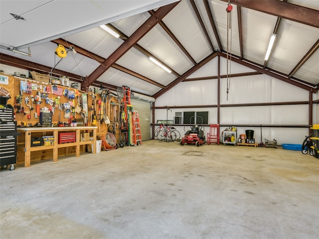 garage with a workshop area