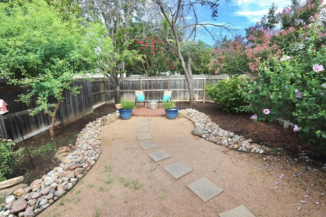 view of yard with a wooden deck