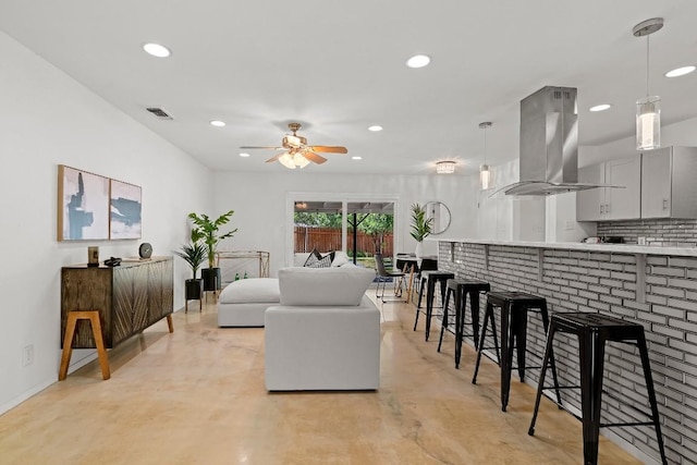 living room with ceiling fan