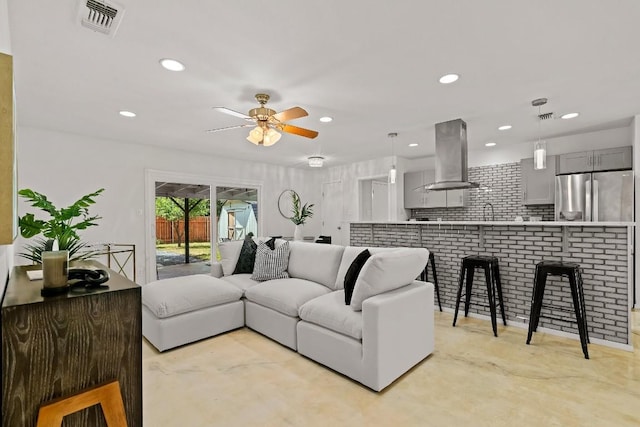 living room featuring ceiling fan