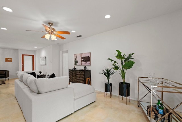 living room featuring ceiling fan