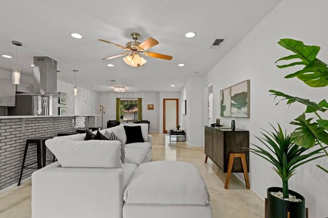 living room with ceiling fan