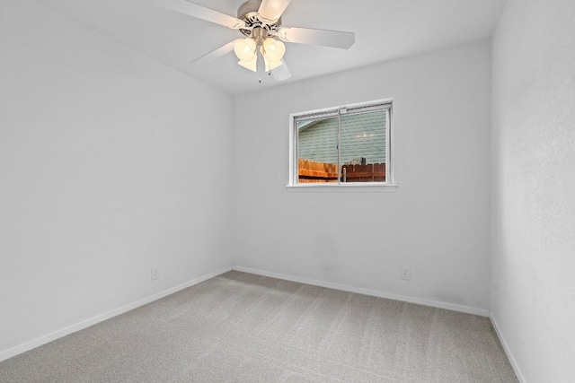 unfurnished room featuring carpet floors and ceiling fan