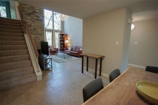 living room featuring light tile patterned flooring