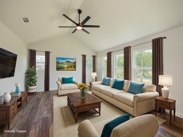 living room featuring light wood-type flooring, ceiling fan, and high vaulted ceiling