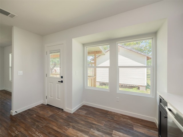 entrance foyer featuring dark hardwood / wood-style flooring