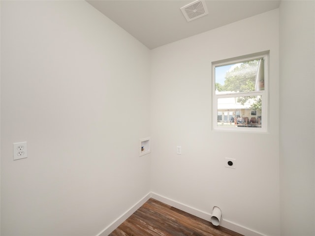 clothes washing area featuring washer hookup, dark wood-type flooring, and hookup for an electric dryer