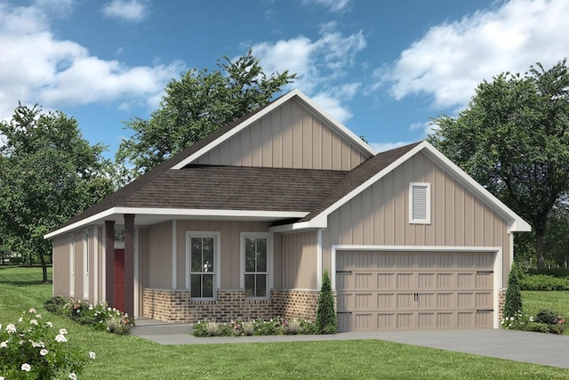 view of front facade with a garage and a front lawn