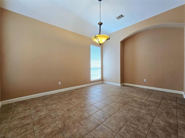 view of tiled spare room