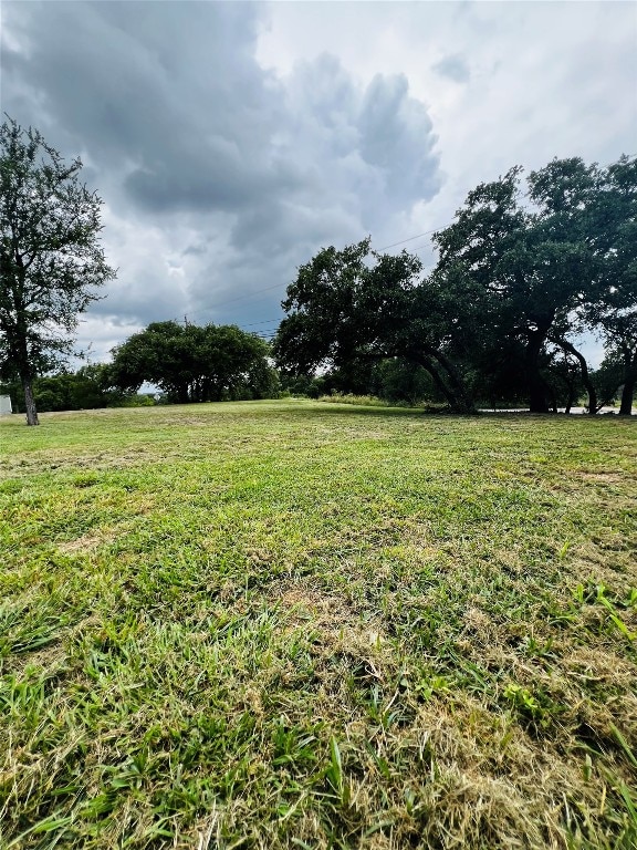 view of yard with a rural view