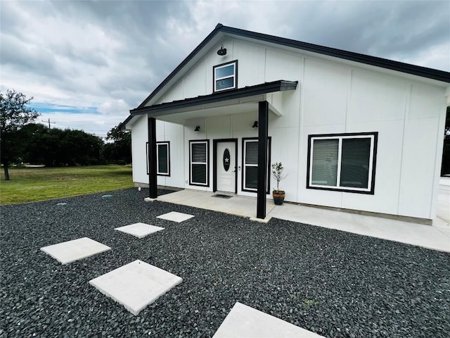 view of front of home featuring board and batten siding