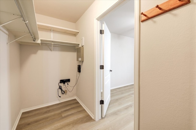 washroom with hardwood / wood-style flooring