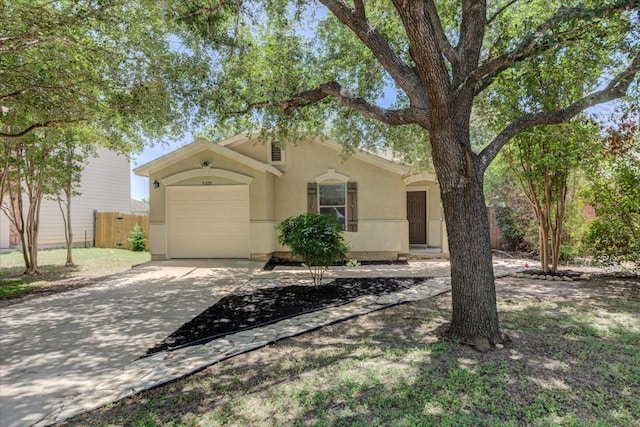 ranch-style house featuring a garage