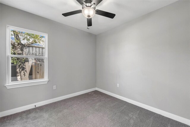 unfurnished room with carpet and ceiling fan