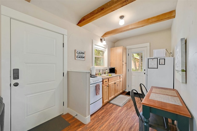 kitchen featuring wood-type flooring, light brown cabinets, white stove, sink, and lofted ceiling with beams