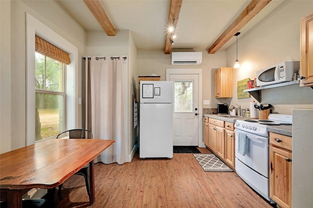 kitchen with decorative light fixtures, light wood-type flooring, white appliances, an AC wall unit, and beamed ceiling