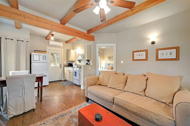 living room featuring ceiling fan, a wall mounted AC, beamed ceiling, and hardwood / wood-style flooring