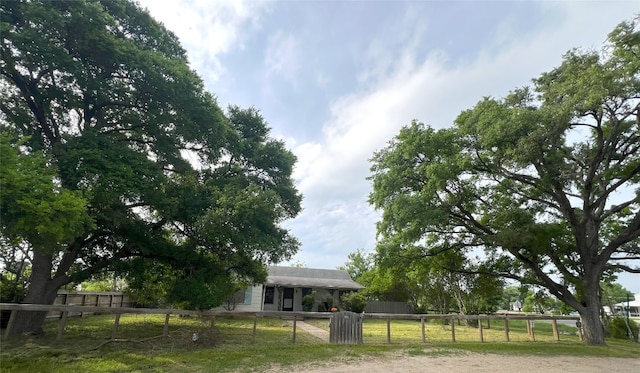 exterior space with a fenced front yard