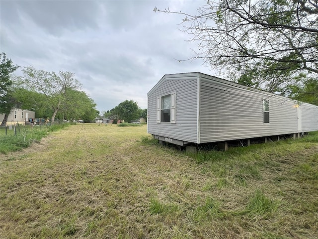 view of outdoor structure with a yard