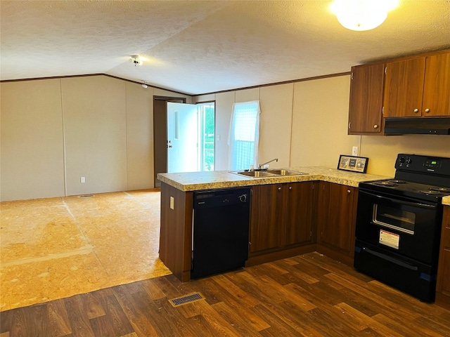 kitchen with black appliances, sink, vaulted ceiling, a textured ceiling, and kitchen peninsula