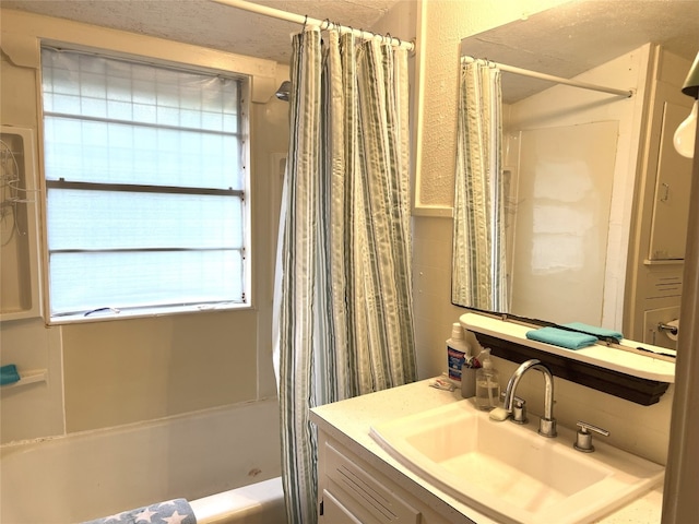 bathroom featuring vanity and shower / tub combo with curtain