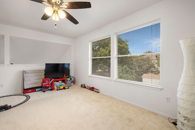 rec room featuring ceiling fan and carpet floors