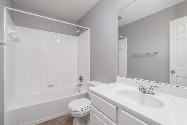 full bathroom featuring tile patterned flooring, vanity, toilet, and shower / bath combination