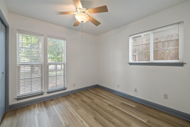 3411 Thomas Kincheon St, Austin, TX 78745 - spare room with wood finished floors and a ceiling fan