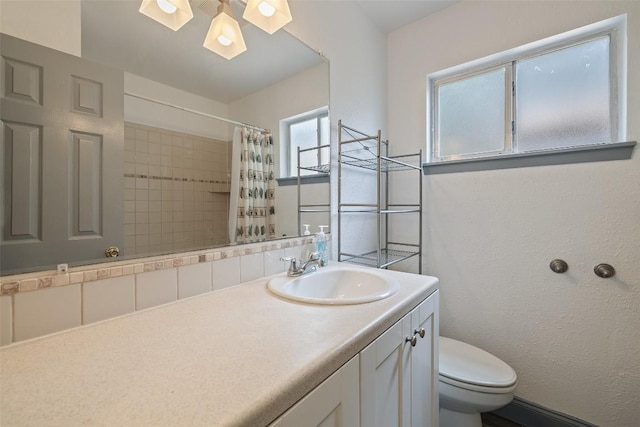 3411 Thomas Kincheon St, Austin, TX 78745 - bathroom featuring vanity and a shower with curtain