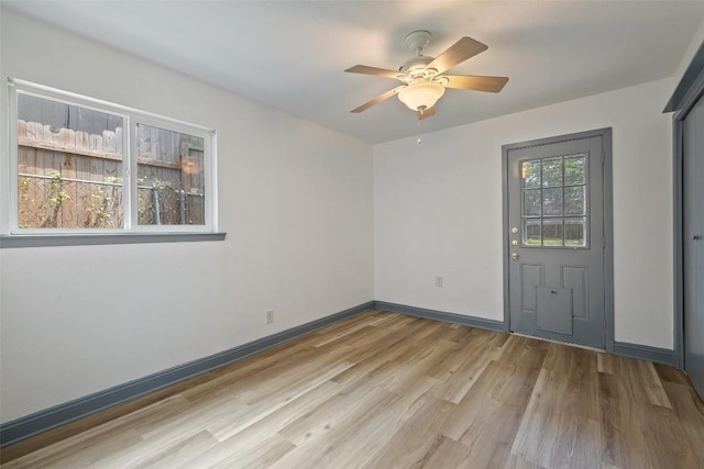 3411 Thomas Kincheon St, Austin, TX 78745 - spare room with light wood finished floors and a ceiling fan