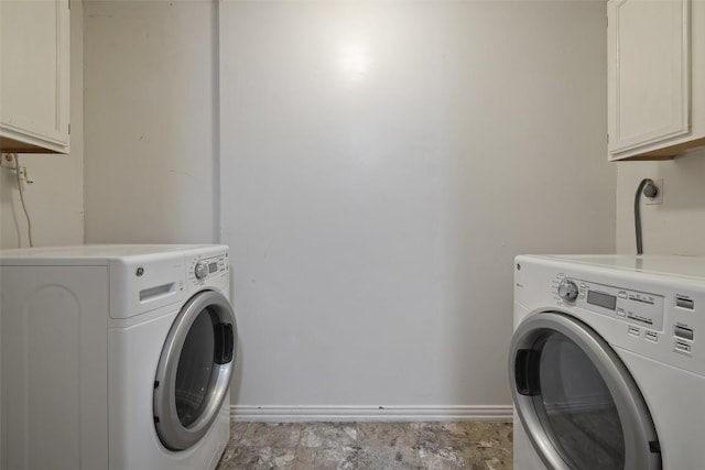 3411 Thomas Kincheon St, Austin, TX 78745 - laundry room with cabinet space and washer and dryer