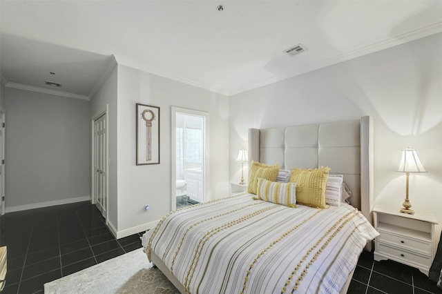 bedroom featuring a closet, connected bathroom, dark tile patterned floors, and crown molding