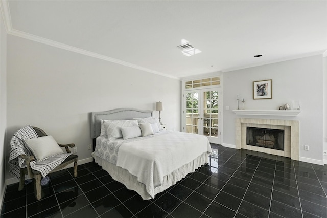 tiled bedroom with ornamental molding, a fireplace, and french doors