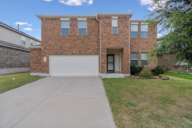 view of front of home featuring a garage and a front lawn