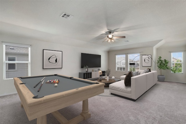 rec room featuring light carpet, plenty of natural light, ceiling fan, and billiards