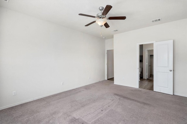 unfurnished bedroom with ceiling fan and light carpet