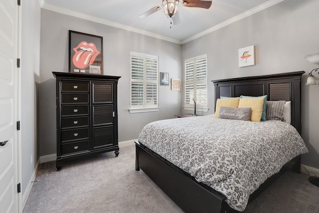 bedroom featuring light colored carpet, ceiling fan, and crown molding