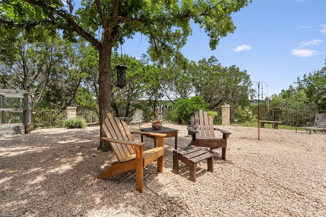 view of patio / terrace featuring fence