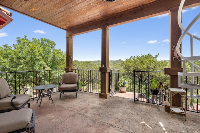 view of patio / terrace with a balcony