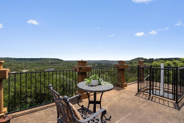 view of patio / terrace featuring a balcony