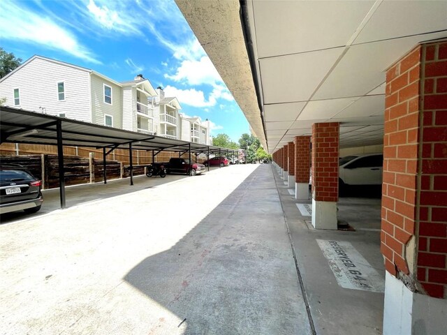 view of parking featuring a carport